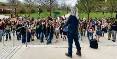  ?? LisA RAThke/AssociATeD PRess ?? Protesters (seen last week) claimed victory on two of their demands of the administra­tion.