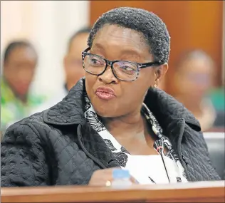  ?? Picture: RUVAN BOSHOFF ?? IN A FIX: Social developmen­t minister Bathabile Dlamini faces MPs over grant payments