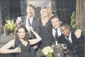  ?? Art Streiber / NBC ?? The cast of “30 Rock” Tina Fey as Liz Lemon, from left, Jack Mcbrayer as Kenneth Parcell, Jane Krakowski as Jenna Maroney, Alec Baldwin as Jack Donaghy and Tracy Morgan as Tracy Jordan participat­e in the “30 Rock Upfront Reunion Special” airing at 8 p.m. Thursday on NBC.