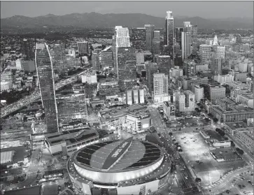  ?? Wally Skalij
Los Angeles Times ?? AN AERIAL VIEW shows Staples Center and L.A. Live. If the city approves the hotel expansion project, AEG intends to start work late this year or early next year, with the rooms scheduled to be available in 2018.