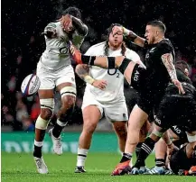  ?? GETTY IMAGES ?? The key moment: All Blacks halfback TJ Perenara has his kick charged down by Courtney Lawes but, as was subsequent­ly ruled, from an offside position.