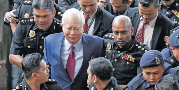  ??  ?? Malaysia’s former prime minister Najib Razak to be charged with money laundering.