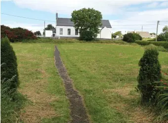  ??  ?? The Church- owned plot next to Rosses Point Church which could be used as a new cemetery.