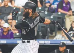  ??  ?? Charlie Blackmon Baseball’s premier leadoff hitter has helped keep the Rockies afloat while the rest of the team’s offense slumbers. Blackmon has hit .455 with two stolen bases in three games against the Marlins this season.