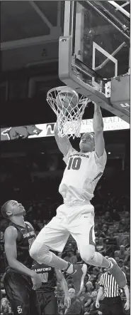  ?? NWA Democrat Gazette/SPENCER TIREY ?? Razorback Daniel Gafford (10) finished with 10 points in 17 minutes in Arkansas’ 95-56 victory over Samford on Friday night at Walton Arena in Fayettevil­le.