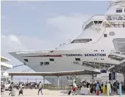  ?? CARL JUSTE cjuste@miamiheral­d.com ?? Cruisers disembark from the Carnival Sensation on March 9 after a weekend of cruise-related coronaviru­s transmissi­on and a State Department warning.