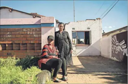  ??  ?? A caring call: Jeanny Mbalati and her daughter Dinah outside their home in Soweto. Jeanny’s brother David stayed with the family in this room, now used for storage, for more than a year before they could find him help after he was removed from Life Esidimeni facilities. Photos: Oupa Nkosi