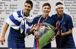  ??  ?? CUP WIN: Barca’s Suarez, Messi and Neymar lift the trophy