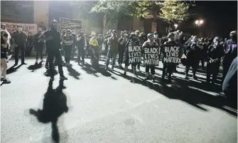  ?? MARCIO JOSE SANCHEZ, THE ASSOCIATED PRESS ?? A crowd gathers during a Black Lives Matter protest at the Mark O. Hatfield United States Courthouse in Portland, Oregon. After days of clashes with U.S. federal agents, there was relative calm in a protest that lasted into early Friday.