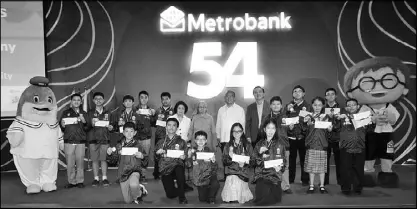  ??  ?? Winners of the 2017 Metrobank-MTAP-DepEd Math Challenge national finals held last April 22. They were awarded by (top row, from 6th from left) MBFI executive vice president Elvira Ong-Chan, , MTAP president Sr. Iluminada Coronel, Manila Tytana Colleges...