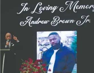  ?? AP PHOTO/GERRY BROOME ?? The Rev. Al Sharpton speaks during the funeral for Andrew Brown Jr. on May 3, 2021, at Fountain of Life Church in Elizabeth City, N.C. On Monday, a North Carolina sheriff’s office announced a $3 million settlement in a lawsuit filed by the family of Brown, who was shot and killed while unarmed by sheriff’s deputies more than a year earlier.