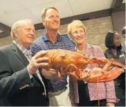  ?? MIKE STOCKER/STAFF PHOTOGRAPH­ER ?? Golf legend Jack Nicklaus, with his son Jack Nicklaus II, and his wife Barbara at the restaurant opening.