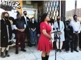  ?? SAM CHARLES/SUN-TIMES ?? Whitney Hampton, center, owner of A Progeny Global, a real estate company in south suburban Oak Forest, was one of several local Black business owners hoping for a strong voter turnout.