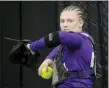  ?? ASSOCIATED PRESS FILE PHOTO ?? James Madison catcher Lauren Bernett throws during an NCAA college softball game last year on in Columbia, Mo.