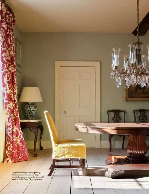  ??  ?? The pared-back space was inspired by Vermeer’s interiors. A Second Empire gasolier hangs above a bespoke dining table made by Rollitt from 19th-century timber