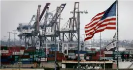  ?? PATRICK T. FALLON/BLOOMBERG VIA GETTY IMAGES ?? The Port of Los Angeles in San Pedro, Calif., is one of the gateways for container ships that bring imports from Asia.