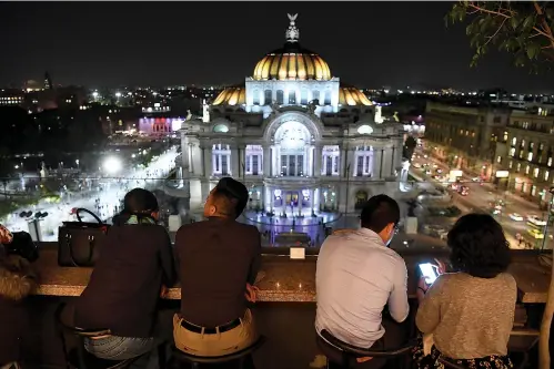  ?? Wally Skalij/Los Angeles Times/TNS ?? ■ A February view from the Sears building of the Palacio de Bellas Artes in Mexico City.