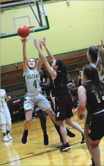  ?? Photo by Ernest A. Brown ?? North Smithfield sophomore Calla Puccetti (4) hit a pair of 3-pointers and scored 15 points to help the Northmen defeat visiting Woonsocket, 51-44, in a Division III contest at Lovett Gymnasium Thursday night.