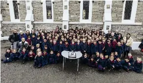  ?? PHOTOS: RHYVA VAN ONSELEN ?? Many happy returns . . . Presentday pupils, current and former teachers and parishione­rs celebrate Queenstown’s St Joseph’s School’s 140th birthday on Tuesday.