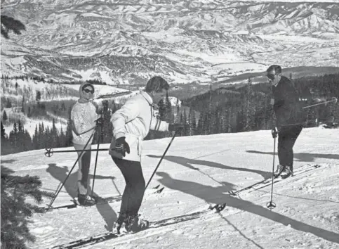  ?? Provided by Aspen Historical Society ?? Legendary ski racer Stein Eriksen, center, his wife Françoise Eriksen, left, and Colorado Gov. John Love ski at Snowmass in 1968.