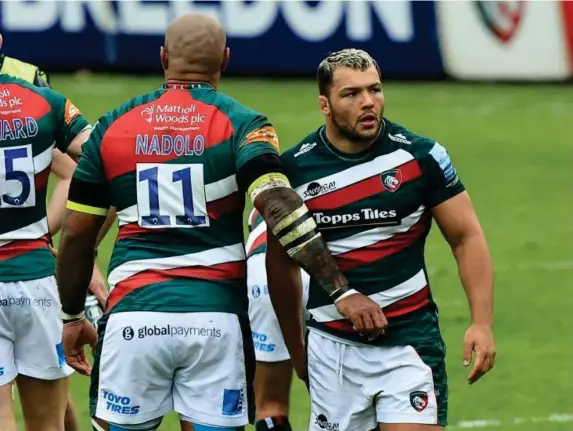  ??  ?? Prop is congratula­ted by teammates after scoring for the Tigers (Getty)