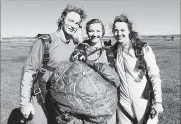  ??  ?? SIBLINGS David, Christy and Jessica Wise after skydiving in 2015 in Texas. They have a lot to be grateful for.