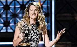  ?? CHRIS PIZZELLO/INVISION ?? Laura Dern accepts the award for outstandin­g supporting actress in a limited series or movie for "Big Little Lies" at the 69th Primetime Emmy Awards on Sunday.