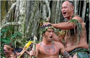  ??  ?? The grunting ‘‘ho, he’’ of the pig dance becomes a familiar soundtrack during a Marquesan visit.