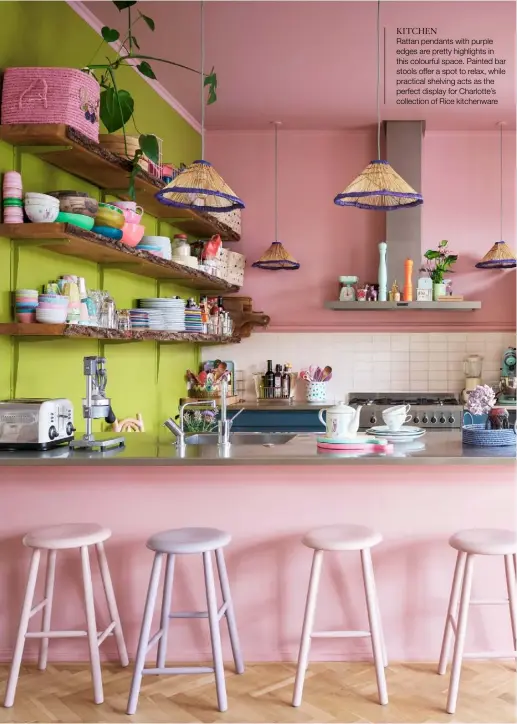  ??  ?? KITCHEN
Rattan pendants with purple edges are pretty highlights in this colourful space. Painted bar stools offer a spot to relax, while practical shelving acts as the perfect display for Charlotte’s collection of Rice kitchenwar­e