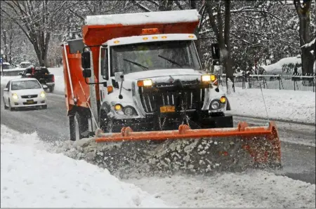  ?? FILE PHOTO ?? Department of Public Works plows Circular Street in Saratoga Springs.