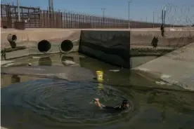  ?? Photograph: Meghan Dhaliwal/The Guardian ?? Dilan Rodríguez, eight, fishing in the canal that runs adjacent to the dry Colorado River at the border of Mexico and the US on 6 September 2019.