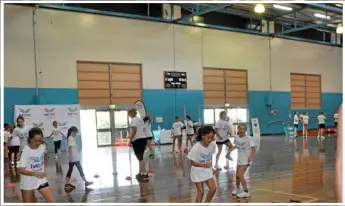  ??  ?? ON COURT: Former Queensland Firebirds and Australian Diamonds star Laura Geitz passed on some of her knowledge to young netballers during the Fuel2Fly netball clinic conducted at St Ursula’s College earlier this week.