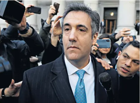  ??  ?? Michael Cohen leaves a federal court building in Manhattan yesterday after pleading guilty to lying to Congress about his pursuit of the Moscow Trump Tower deal during campaign