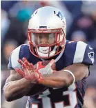  ?? WINSLOW TOWNSON/USA TODAY SPORTS ?? New England running back Dion Lewis, above, starts but splits time with James White and Rex Burkhead.