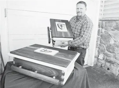  ?? JOSHUA MCKERROW/CAPITAL GAZETTE ?? James Howard, of Annapolis, stands with the special caskets he made by hand for the remains from the Smith Price graveyard that will be laid to rest in a ceremony Nov. 1.