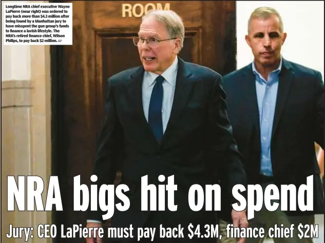  ?? AP ?? Longtime NRA chief executive Wayne LaPierre (near right) was ordered to pay back more than $4.3 million after being found by a Manhattan jury to have misspent the gun group’s funds to finance a lavish lifestyle. The NRA’s retired finance chief, Wilson Philips, to pay back $2 million.