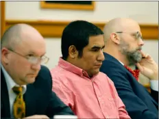  ?? Jeff reInItz/the cOurIer VIa aP ?? Zachary Koehn (center) is flanked by attorneys Les Blair III and Steven Drahozal, as he sits in court Tuesday, Oct. 30, 2018 in Mount Pleasant, Iowa.