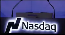  ?? MARK LENNIHAN — THE ASSOCIATED PRESS ?? The Nasdaq logo is displayed in the electronic stock trading company’s Times Square location in New York.