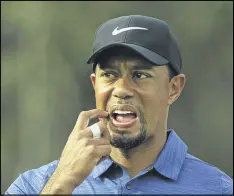  ?? KAMRAN JEBREILI / AP ?? Tiger Woods said this week his focus remains to play the Masters. “The whole plan was to get body, mind and spirit ready for the first week in April.”