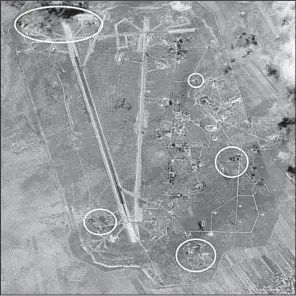  ?? AP/U.S. Department of Defense ?? This satellite image shows a damage assessment after the U.S. missile strike Friday at Shayrat air base in Syria. The missiles were fired from the USS Ross and USS Porter.