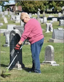  ?? PHOTO COURTESY OF HOBART’S RUN ?? A woman volunteers to help maintain the Edgewood Cemetery in Pottstown.