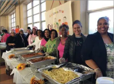  ?? SUBMITTED PHOTOS ?? Alpha Kappa Alpha Sorority from West Chester University recently served more than 125 hot meals at the Cecil and Grace Soup Kitchen in Norristown.