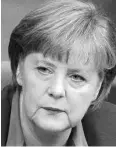  ??  ?? A tired-looking Angela Merkel said she would stay on as acting chancellor and consult President Frank-Walter Steinmeier on how to move forward