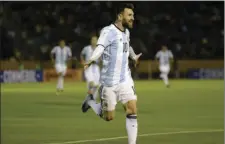  ??  ?? Argentina’s Lionel Messi celebrates after scoring his third goal against Ecuador during their 2018 World Cup qualifying soccer match at the Atahualpa Olympic Stadium in Quito, Ecuador, on Tuesday. AP PHOTO/FERNANDO VERGARA