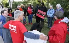  ?? Associated Press ?? Death pentalty protesters pray in a circle outside the Governor’s Mansion in Oklahoma City, Okla., after news the execution of John Grant was carried out Thursday.