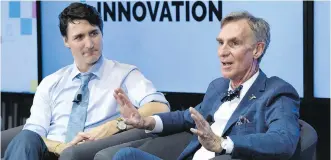 ??  ?? Prime Minister Justin Trudeau participat­es in a discussion with Bill Nye.