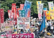  ?? REUTERS ?? Protesters march against the talks between the US, Japan and other Quad leaders in Tokyo, Japan.