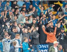  ??  ?? St Johnstone fans get behind their team.