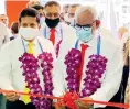  ??  ?? The relocated Kurunegala Branch declared open by DFCC Chairman Jegan Durairatna­m , CEO Lakshman Silva and Deputy CEO Thimal Perera