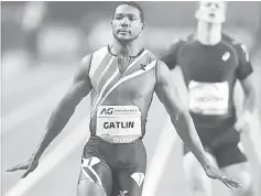  ??  ?? US Justin Gatlin wins the Men’s 200m during the Memorial Van Damme athletics Diamond League meeting in Brussels, in this Sept 5, 2014 file picture. — AFP photo